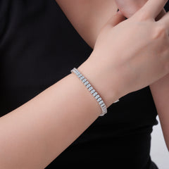A Luxurious And Fashionable Minimalist Jewelry Bracelet Featuring Top-quality Moissanite, Made Of S925 Silver Electroplated With Platinum.