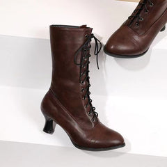 Damenstiefel mit gekreuzter Schnürung, niedrigem Absatz und mittelhohem Schaft